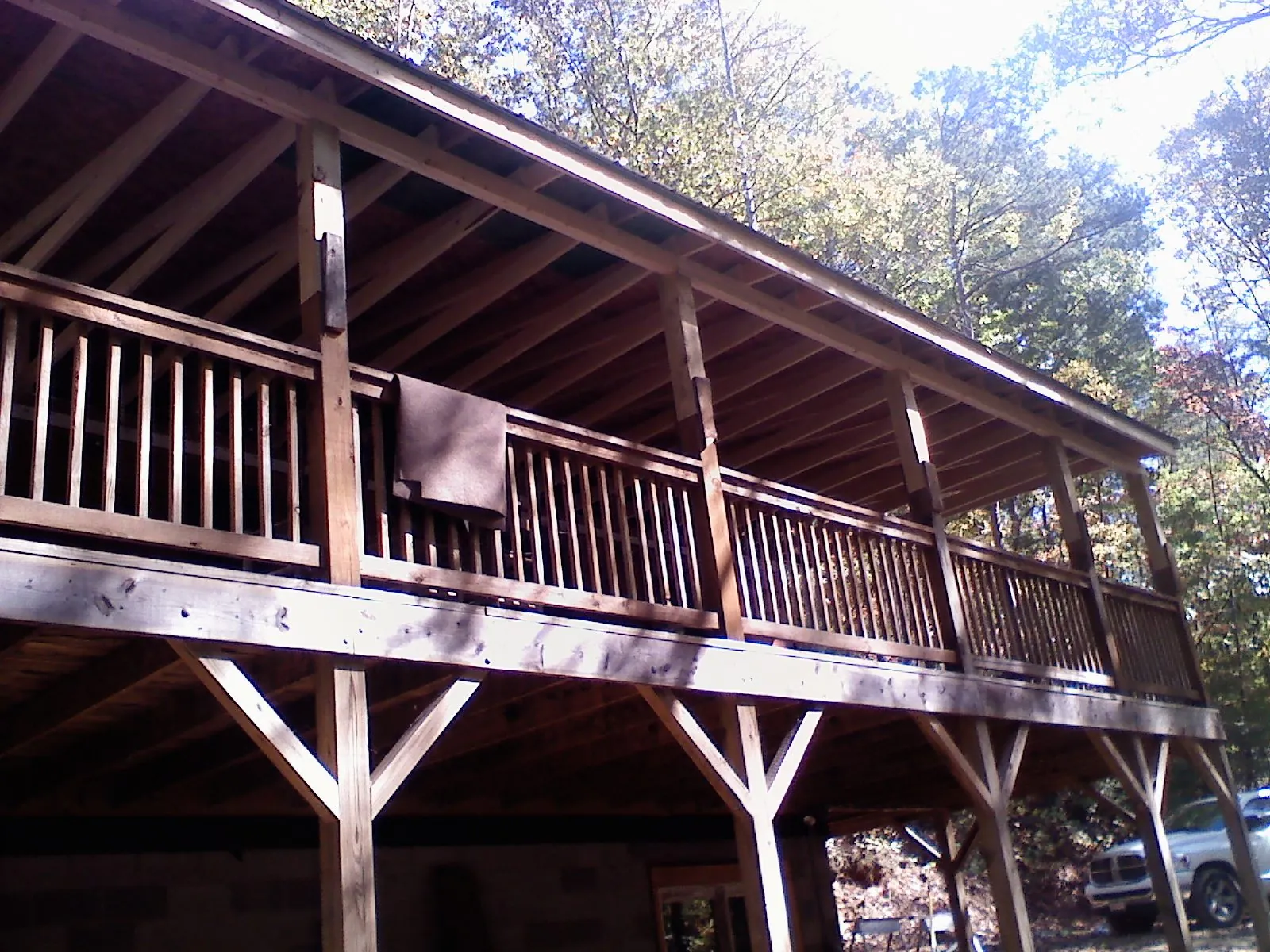Timber framing under a new elevated porch and deck — Roof Leak Repair in Center Cross by Roofing Brothers